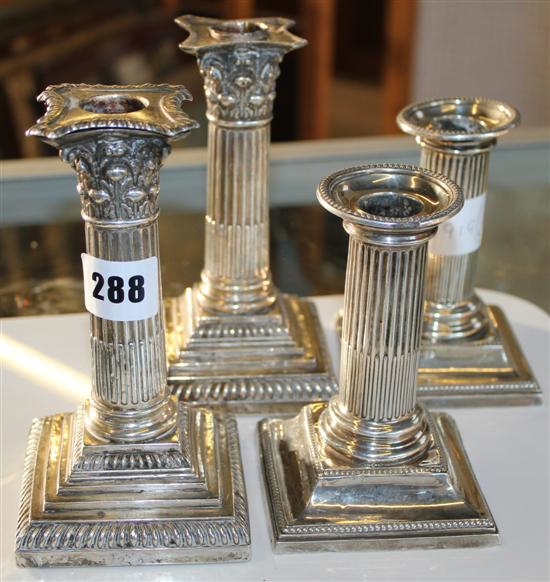 2 pairs silver candlesticks